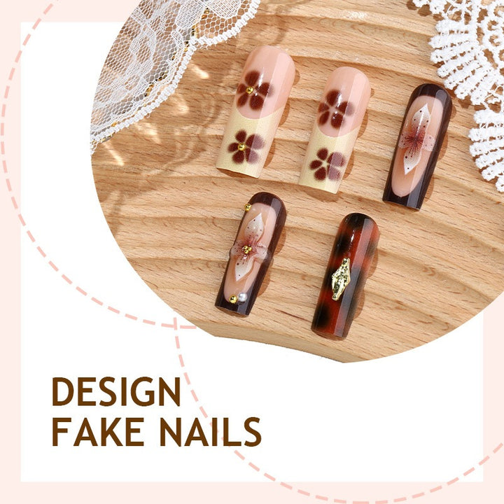 Artificial Nail Art with floral and glamorous design Stornfield
