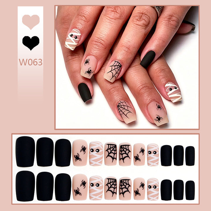 Artificial nail set with creepy Halloween motif and delicate spider designs Stornfield