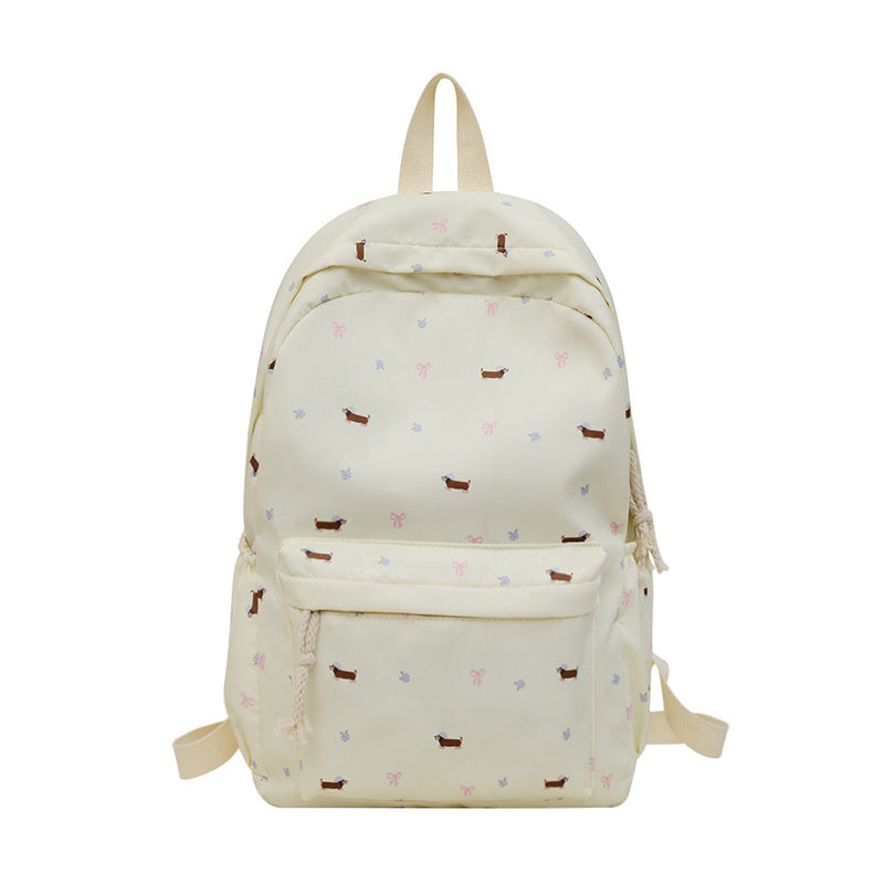 Playful Dog Patterned Backpack Stornfield