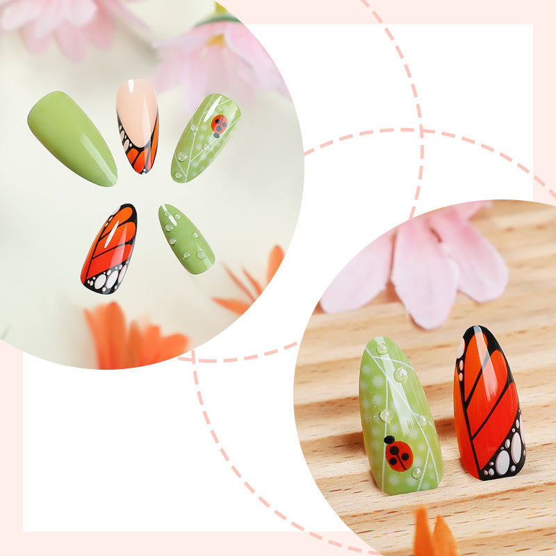 Artistic Press-On Nail Set with Butterfly and Floral Designs Stornfield