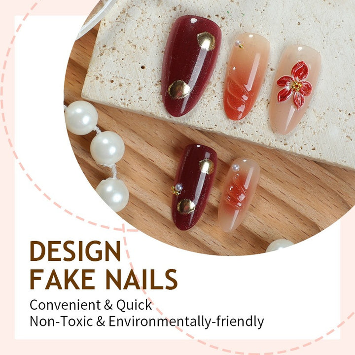 Acrylic nail set with elegant floral accents and glitter details Stornfield