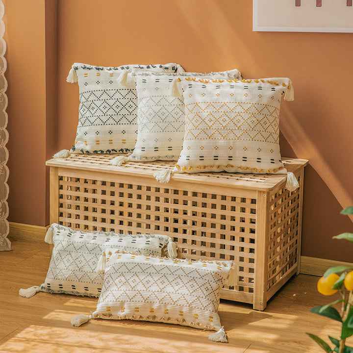 Square decorative cushion cover made of cotton blend with hand-tufted geometric relief and tassels