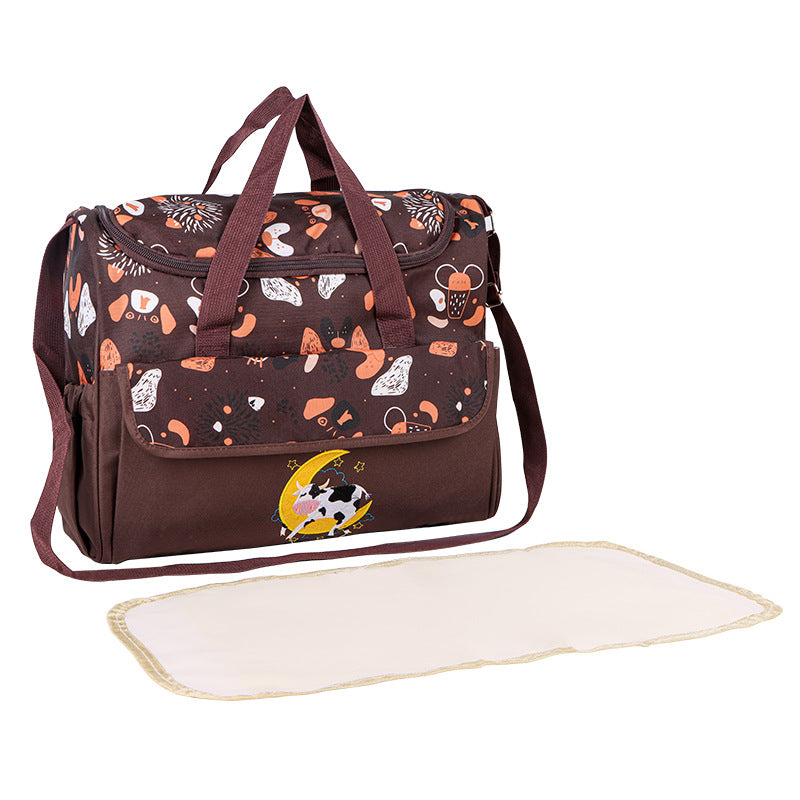 Multifunctional diaper bag with integrated changing mat Stornfield