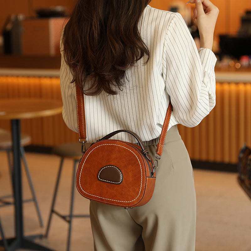 Vintage-Inspired Round Crossbody Bag