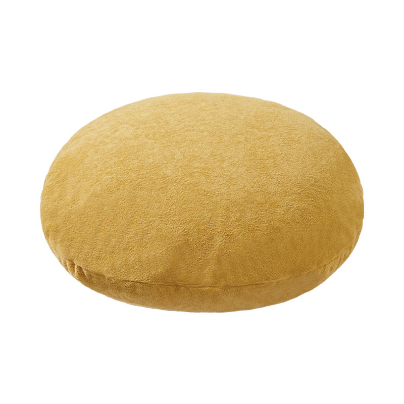 Round floor seat pouf made of teddy plush with a shape-retaining padded core Stornfield