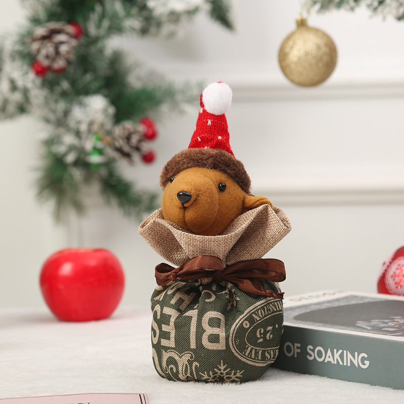 Cute Christmas gnome with gift sack Stornfield