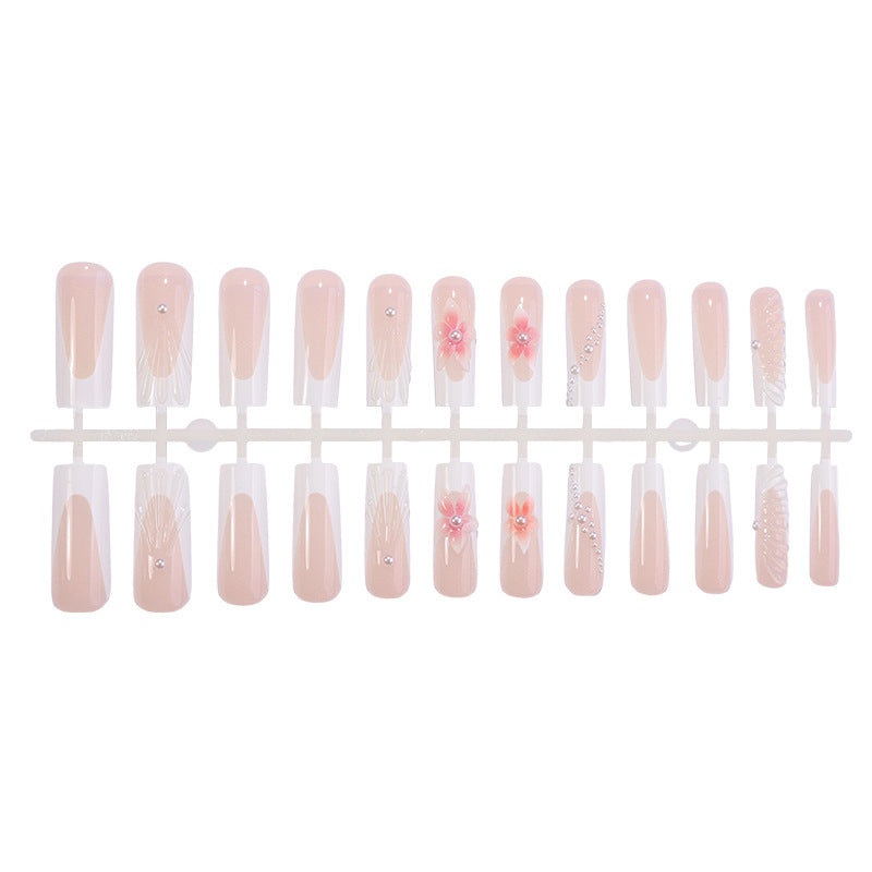 Artificial nail set with elegant flower and glamour decorations Stornfield