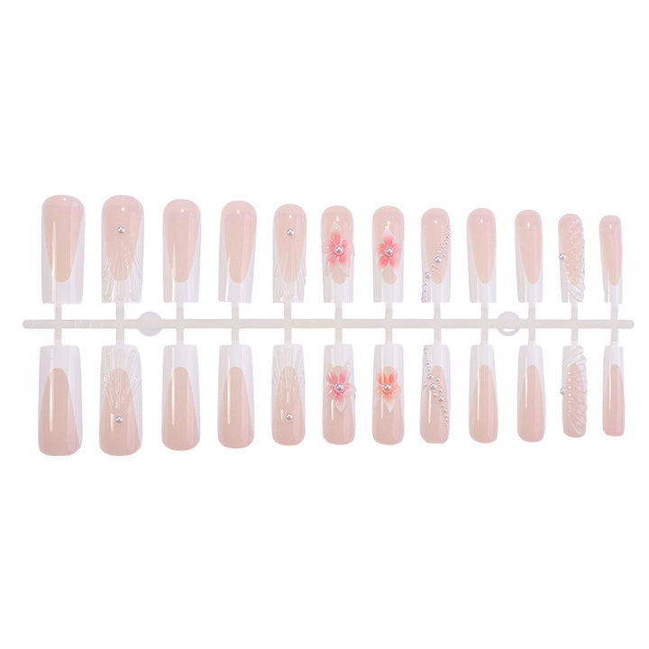 Artificial nail set with elegant flower and glamour decorations Stornfield