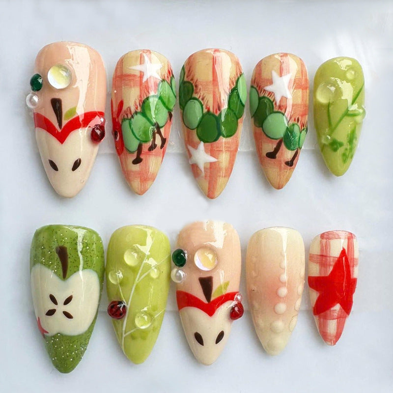 Artificial nail set with cheerful fruit motifs and creative details Stornfield