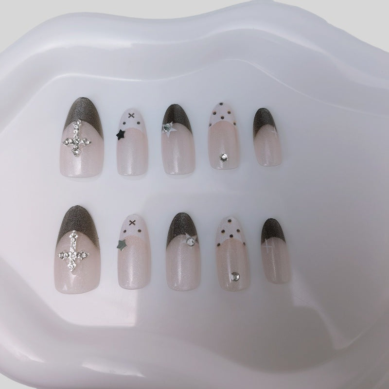 Glittering artificial nail design with elegant accents Stornfield