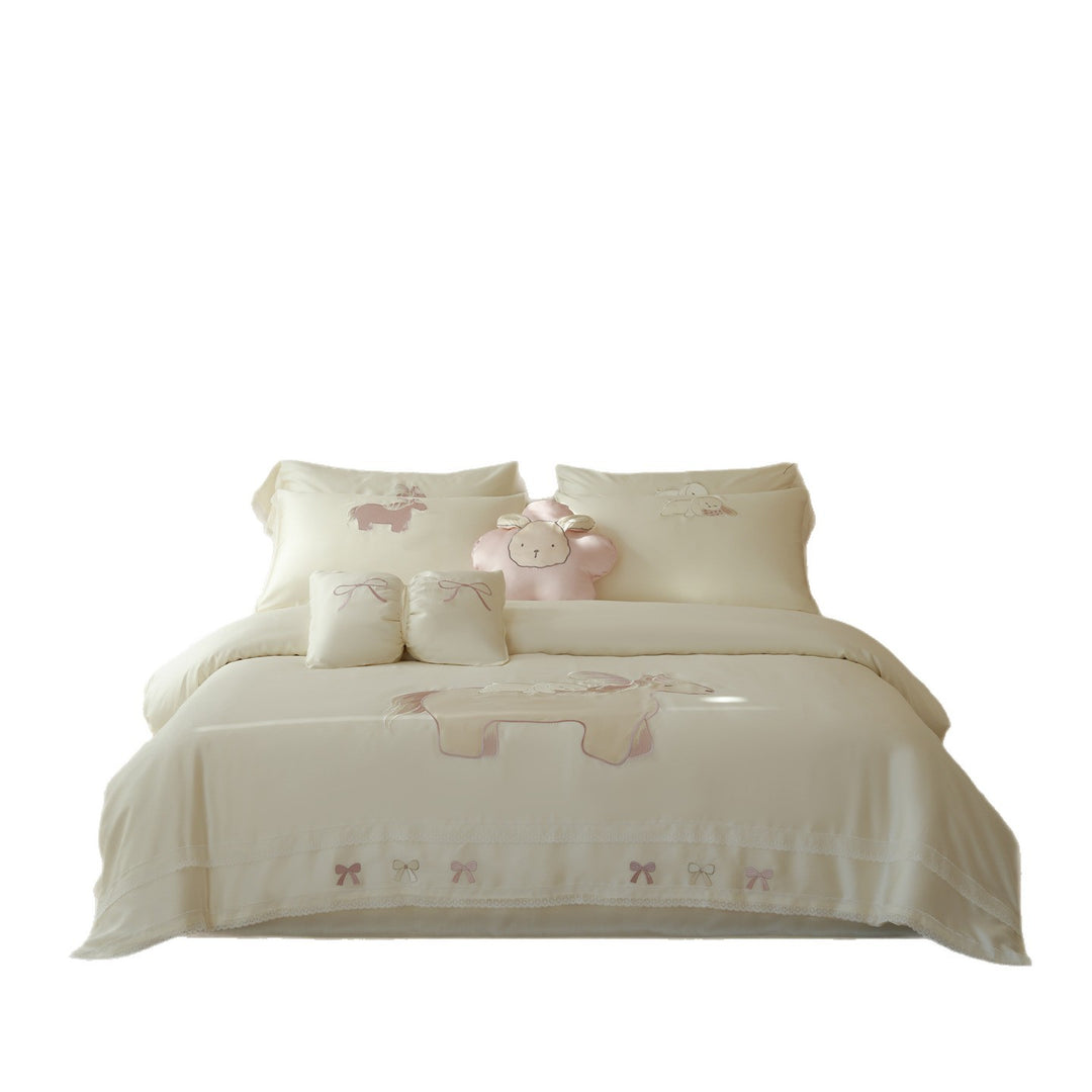 Child bedding set made of cotton satin with appliqués, ruffles, and cuddle pillow
