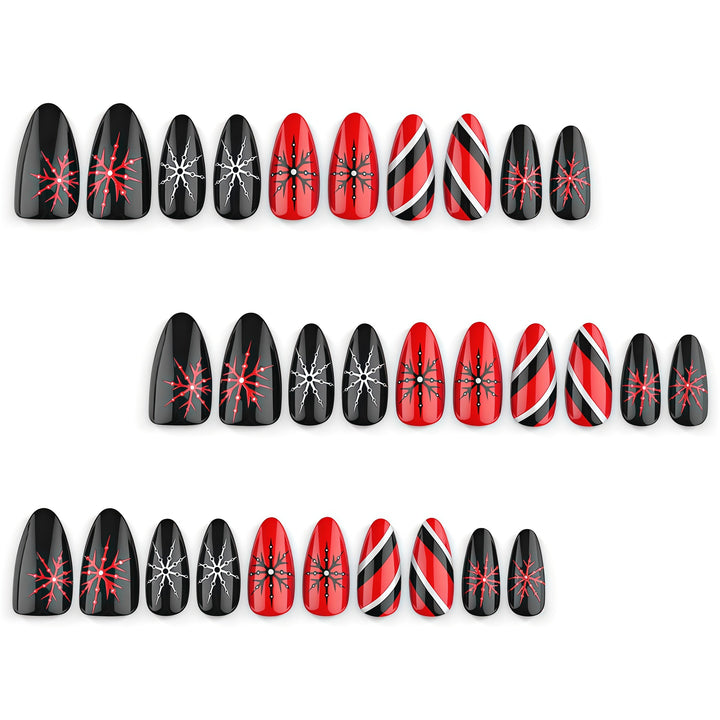 Artificial nails in modern stiletto design with graphic accents Stornfield