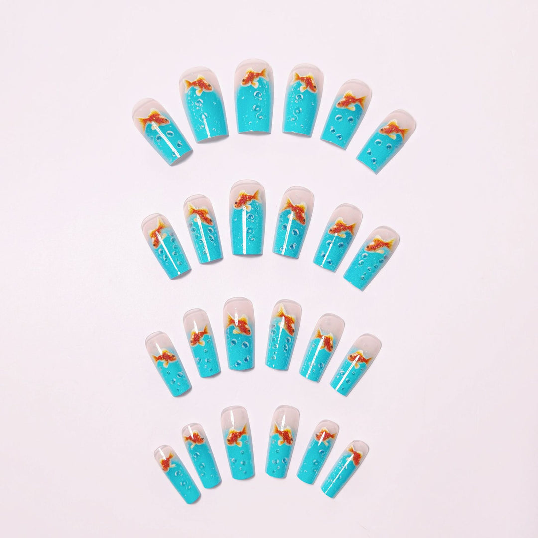 Artificial nail design with golden fish Stornfield