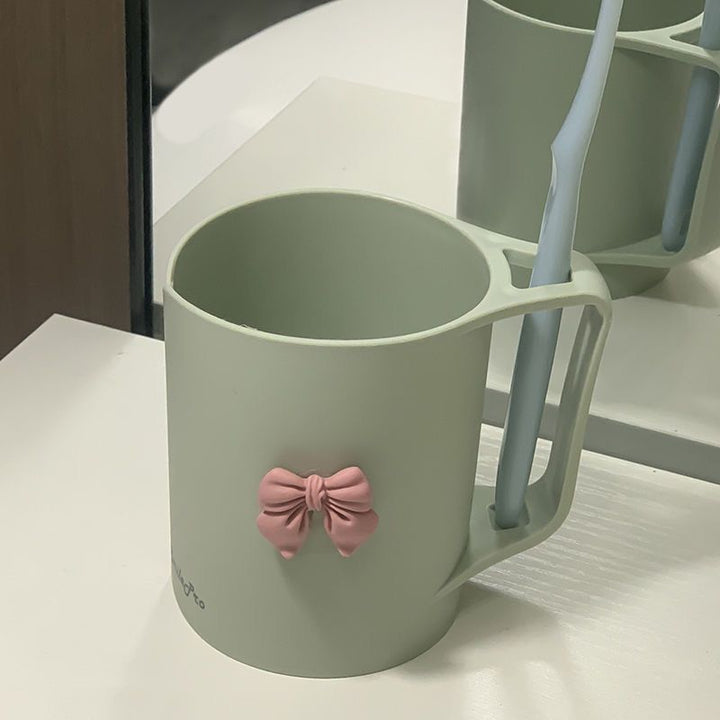 Ceramic mug with elegant bow motif Stornfield