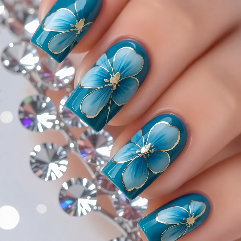 Elaborately designed artificial nails with flower pattern Stornfield