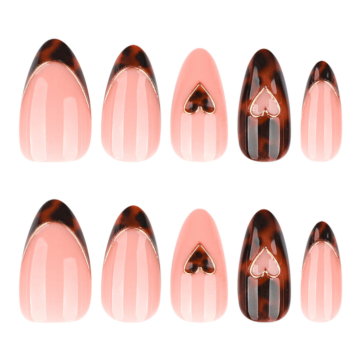 Artful stiletto nails with elegant heart design Stornfield