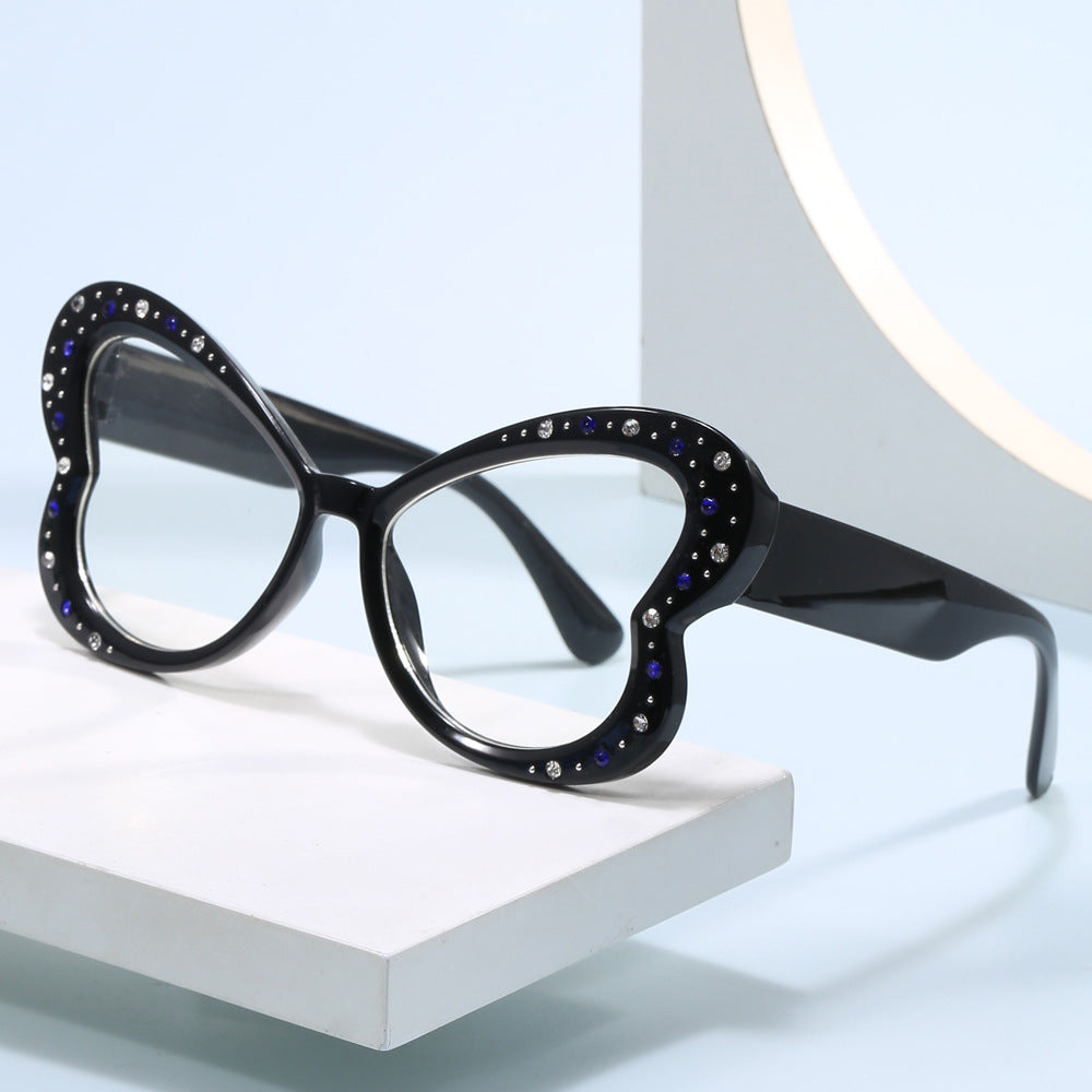 Women's playful heart-shaped sunglasses with glitter accents Stornfield