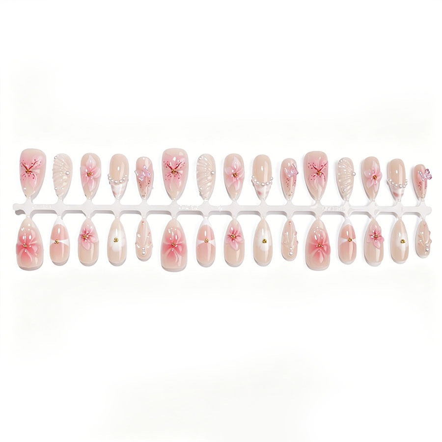 Artificial nail set with floral decorations and 3D accents Stornfield