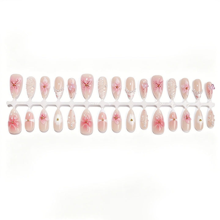 Artificial nail set with floral decorations and 3D accents Stornfield