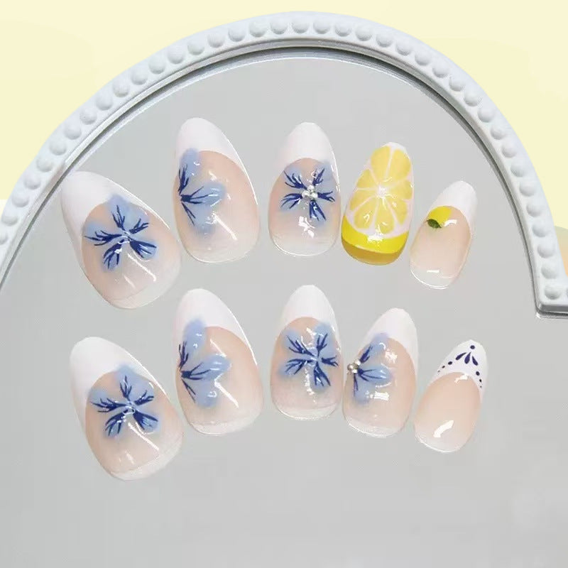 Artistic artificial nails with floral and fruity accents Stornfield