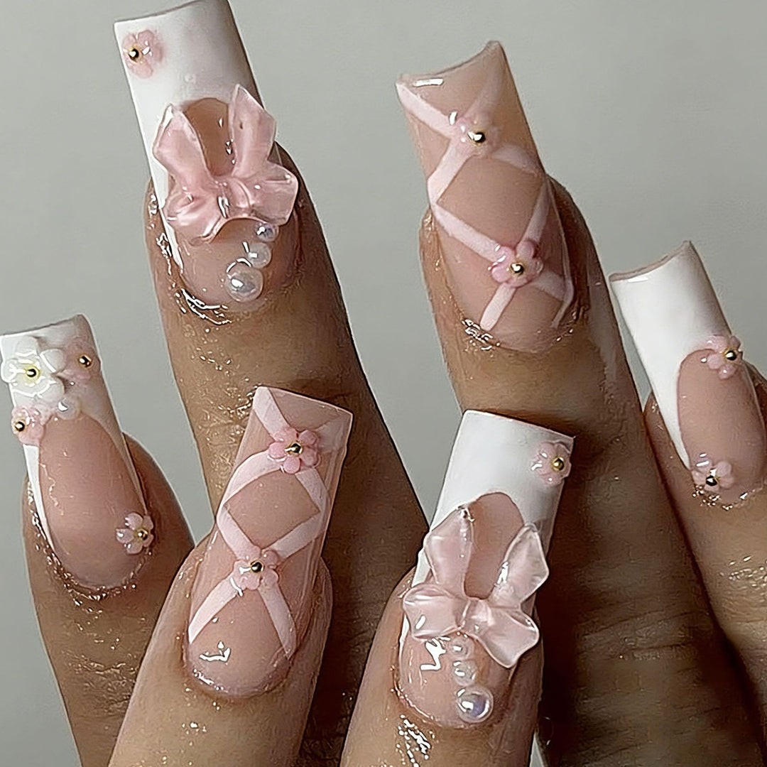 Artistic 3D Nail Tips with Bow Motifs Stornfield