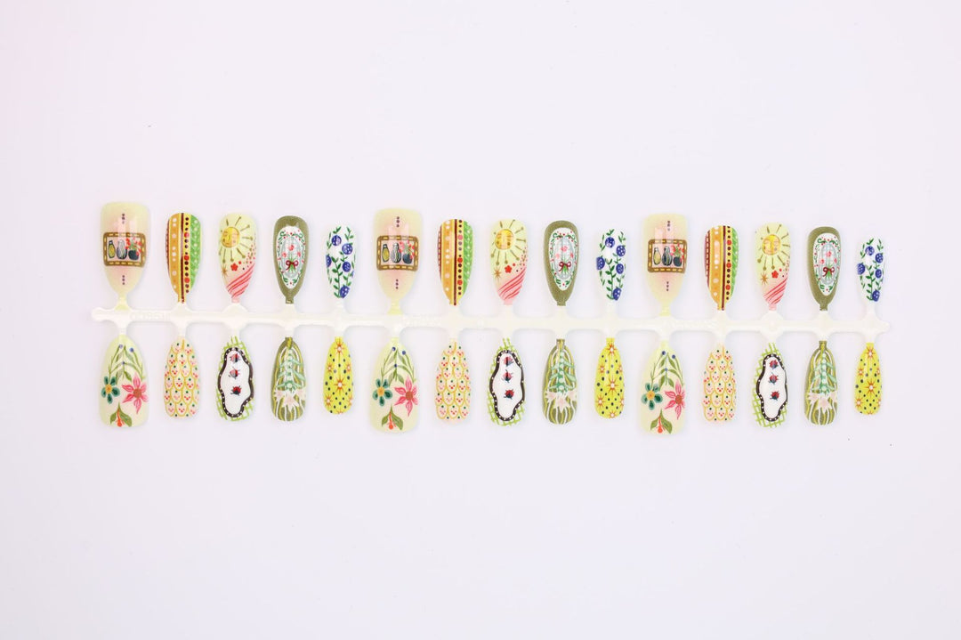 Nail art set with elaborate floral and colorful design Stornfield