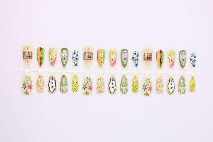 Nail art set with elaborate floral and colorful design Stornfield