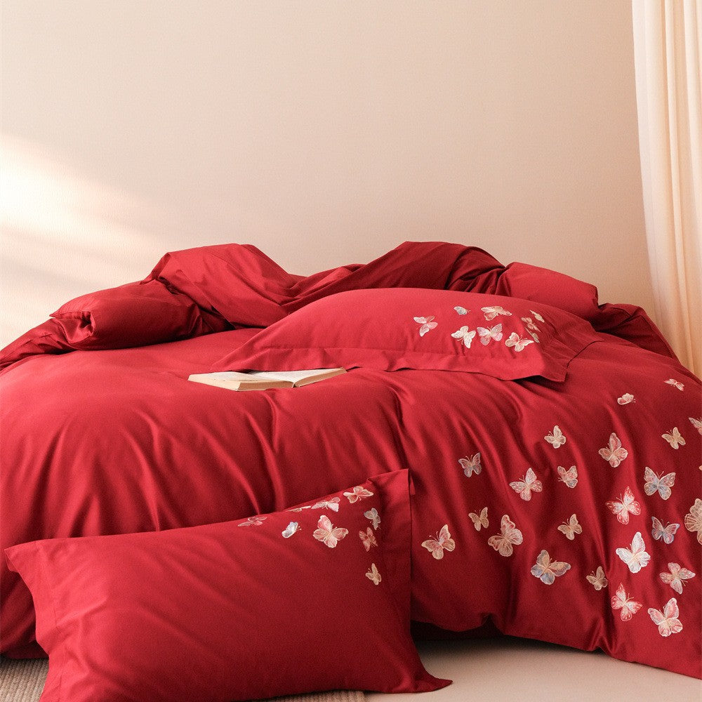 Embroidered bedding set made of cotton satin with butterfly appliqué