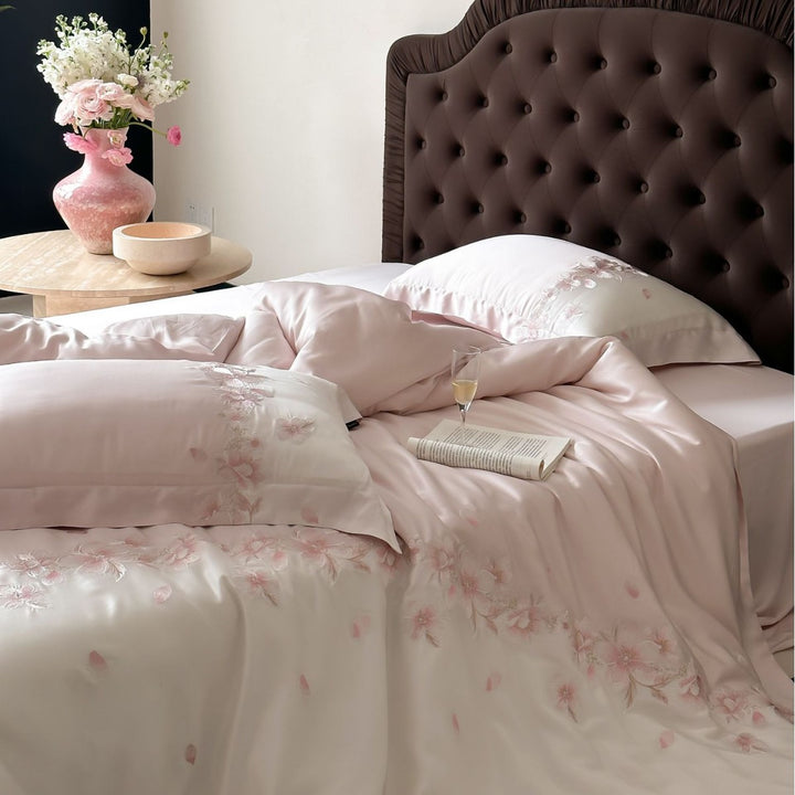 Luxurious satin bedding set with floral embroidery border and silky shine surface