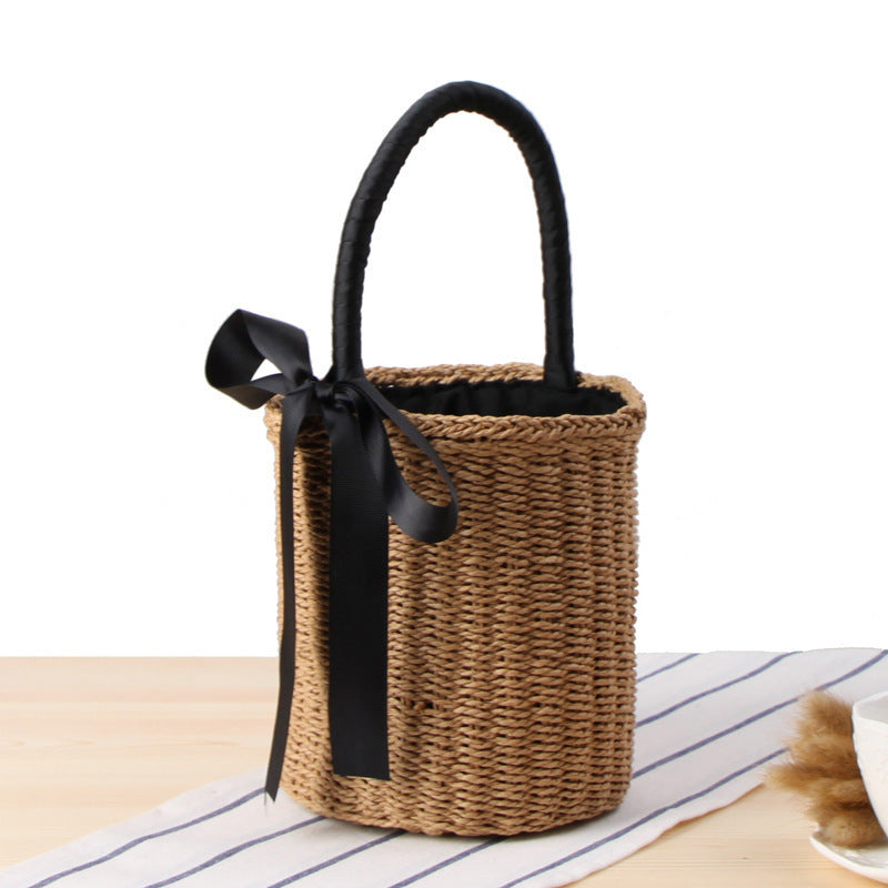 Fashionable basket bag with decorative satin ribbon Stornfield