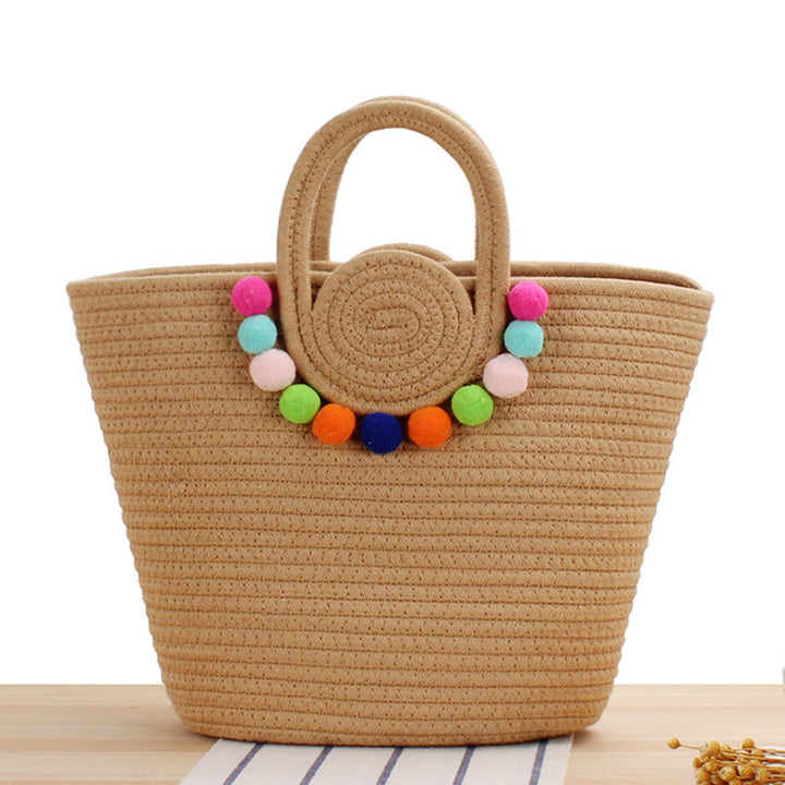 Fashionable handbag with playful pompom decoration Stornfield