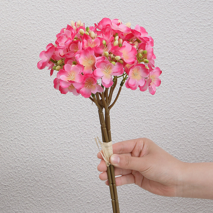 Artificial flower bouquet with delicate blooms