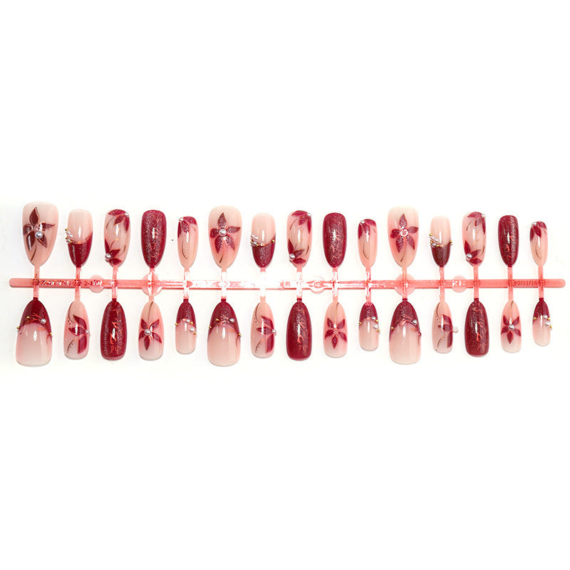 Glamorous artificial nail set with elegant floral and glitter details Stornfield