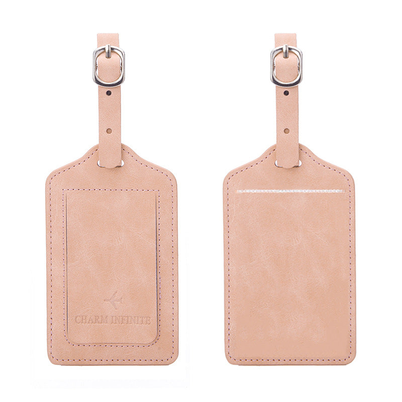 vintage leather luggage tag with transparent ID window and adjustable buckle strap Stornfield