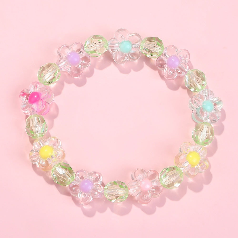 Friendship bracelet with colorful flower motifs Stornfield