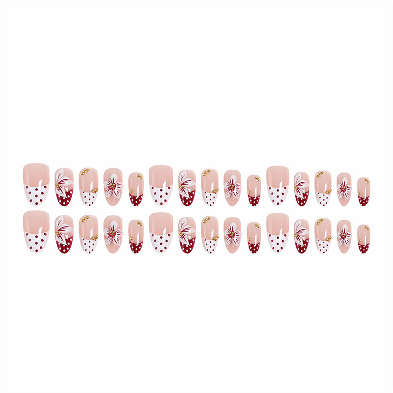Artistic Nail Tips with Floral Decoration Stornfield
