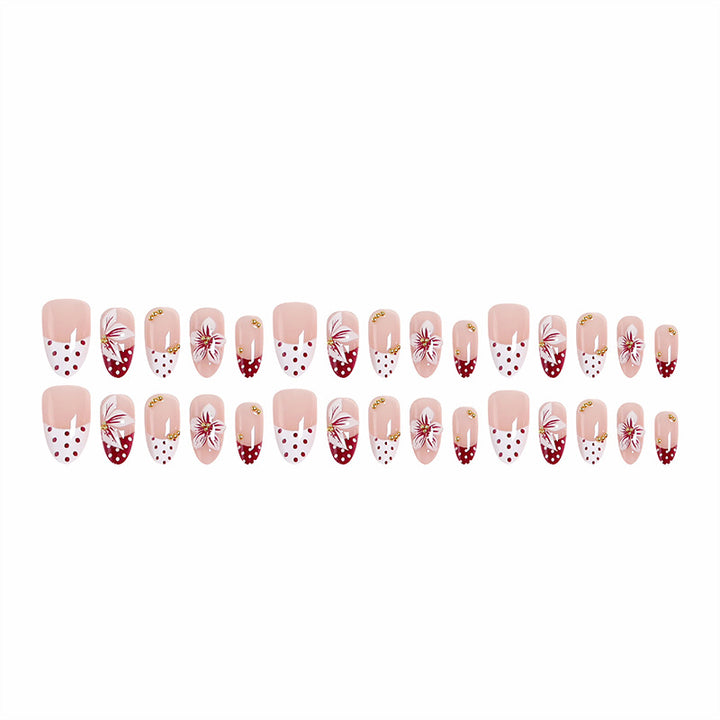 Artistic Nail Tips with Floral Decoration Stornfield