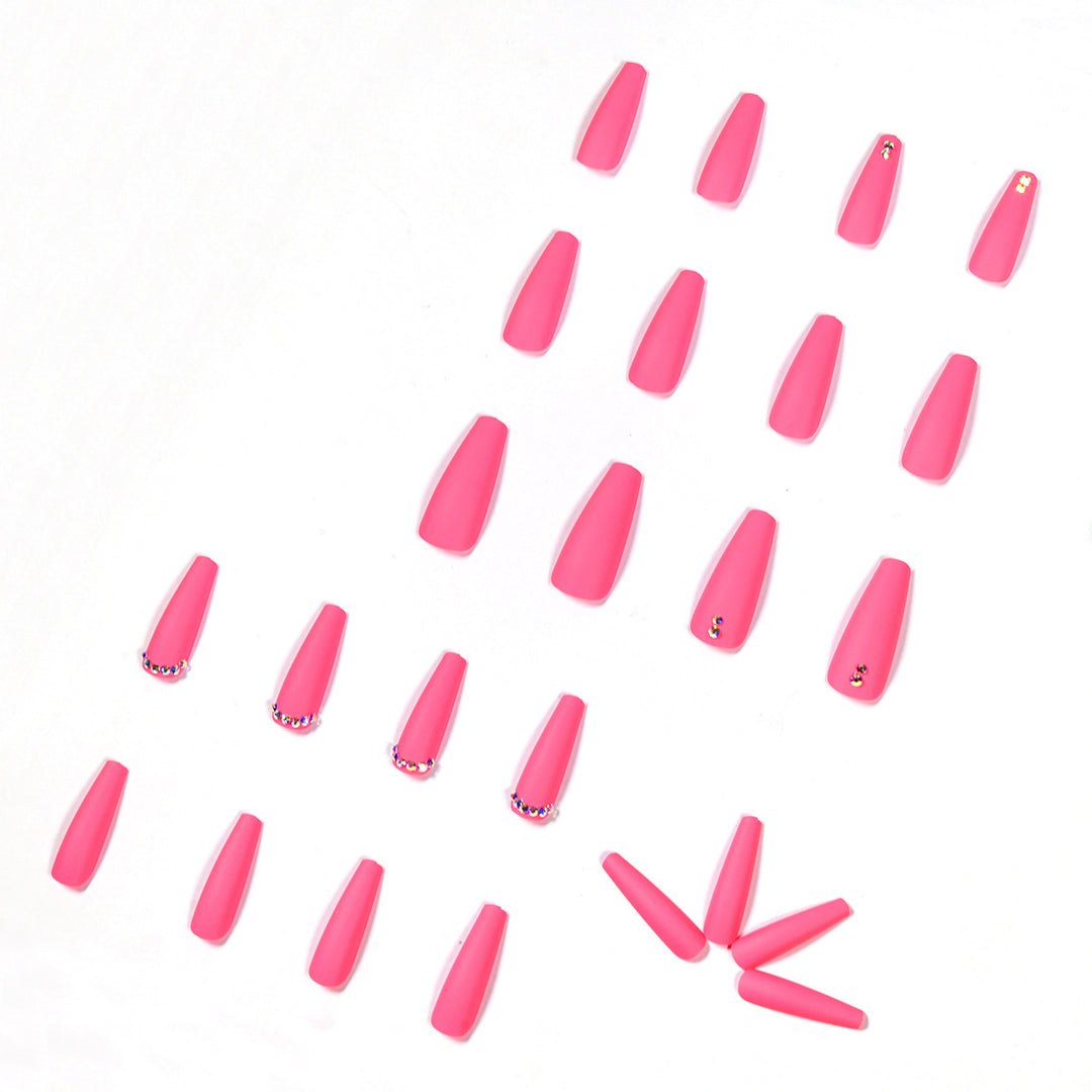 Artificial nail set with matte finish and sparkling rhinestone embellishments Stornfield