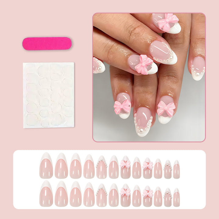Artificial nail set with elegant bow and pearl decorations Stornfield