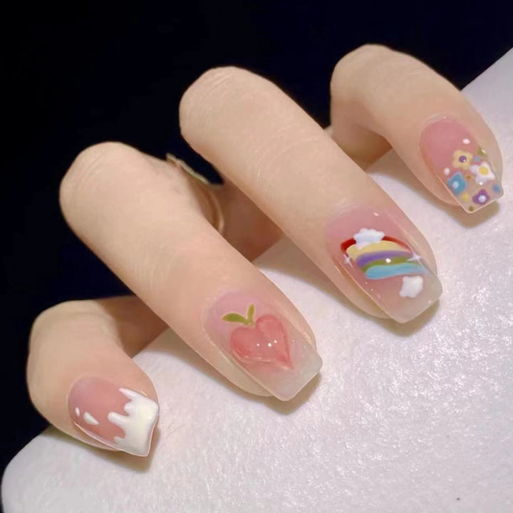 Creative nail art with fruit and flower motifs Stornfield