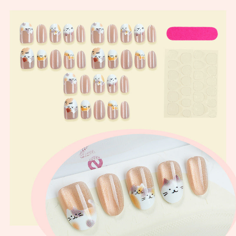 Creative nail art set with cute animal motifs and glitter accents Stornfield