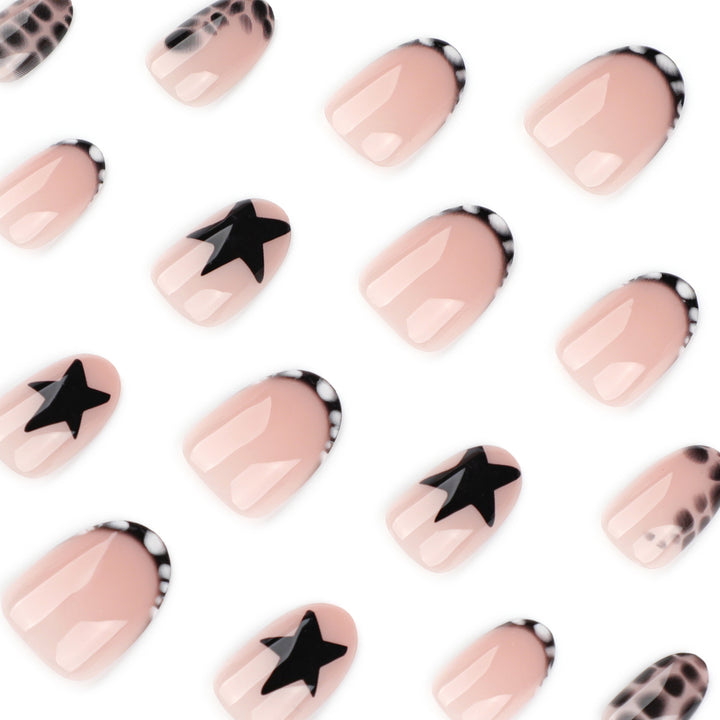 Creative nail art with shimmering star motifs Stornfield