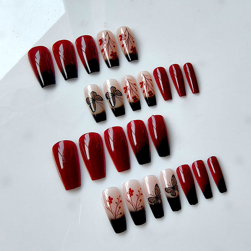 Artificial nails with butterfly and flower motifs Stornfield