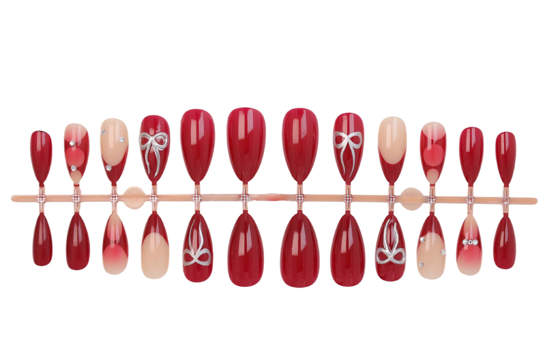 Artificial nail set with luxurious glitter and gemstone embellishments Stornfield