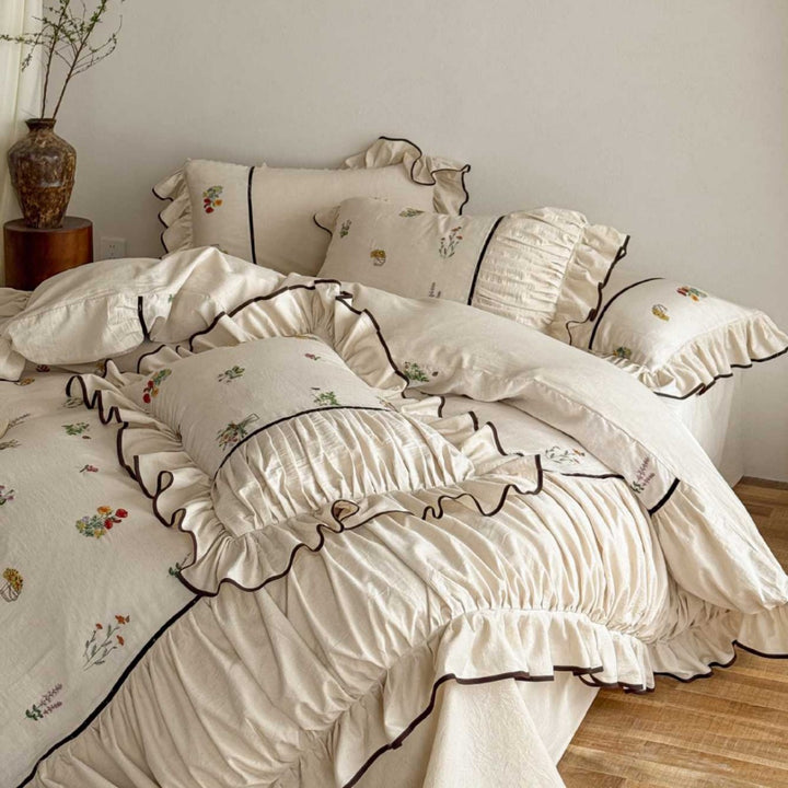High-quality bed linen set made of linen-cotton blend with wildflower embroidery and ruffled hem