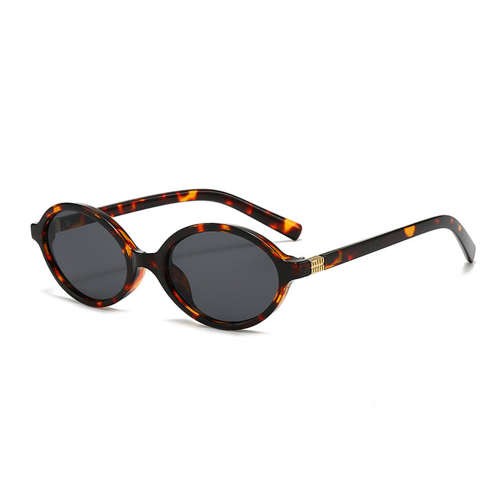 Women's fashionable oval glasses with golden accents Stornfield