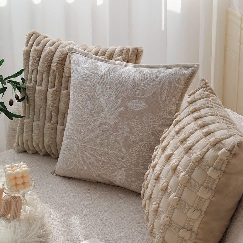 Cozy decorative sofa cushion with faux fur surface and quilted texture pattern Stornfield