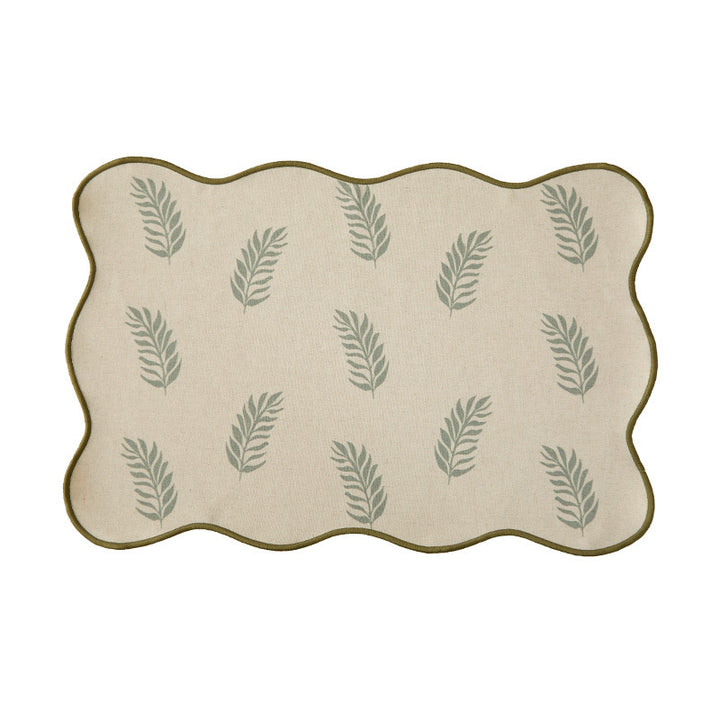 Shaped table set with curved contour and botanical leaf pattern Stornfield