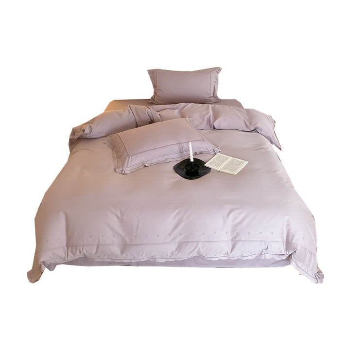 Bedding set made of cotton satin with fine star embroidery and wave hem