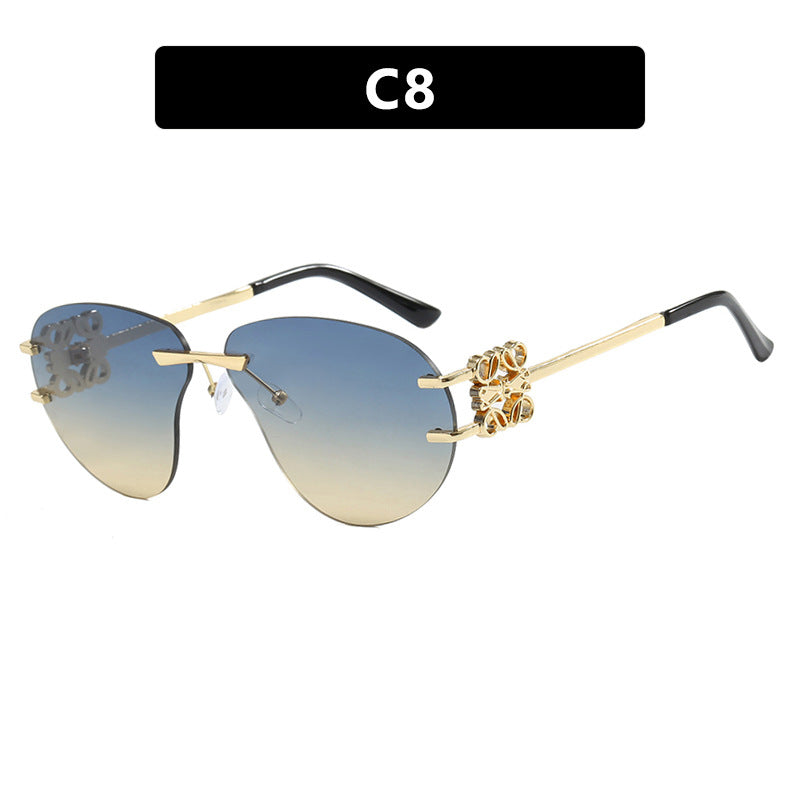 Women's fashionable sunglasses in elegant aviator style with gemstone details Stornfield